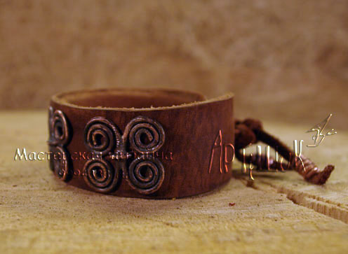 кожаный  дизайнерский браслет   с кованной медью 